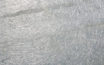 Lower Tale laminate fibreglass or shingles?